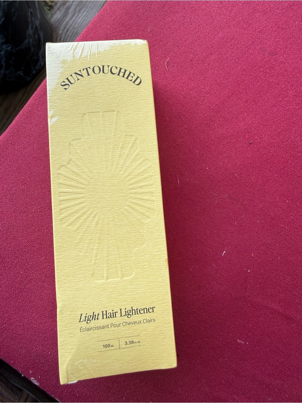 Suntouched Authentic Yellow Light Hair Lightener retails $56 high end